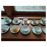 Collection Of Nine Different Teacups With Saucers