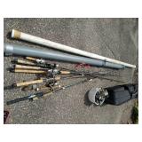 Large Collection of Fishing Poles and Reels