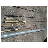 Large Collection of Fishing Poles and Reels