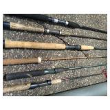 Large Collection of Fishing Poles and Reels