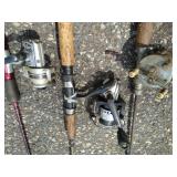 Large Collection of Fishing Poles and Reels