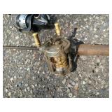 Large Collection of Fishing Poles and Reels