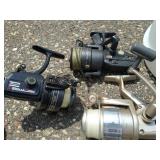 Large Collection of Fishing Poles and Reels
