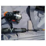 Large Collection of Fishing Poles and Reels