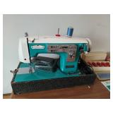 The White House Sewing Machine with Supplies