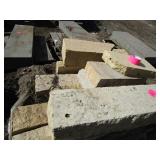 Limestone wall block, largest is ap...