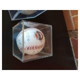 2 signed baseballs
