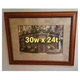 Framed print of a corner café with blooming flowers