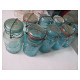 Lot of 9 Blue hued Ball Glass jars ...