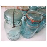 Lot of 9 Blue hued Ball Glass jars ...