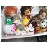 Mail tray with a ton of stuffed plu...