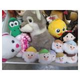 Mail tray with a ton of stuffed plu...