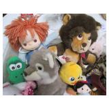 Mail tray with a ton of stuffed plu...