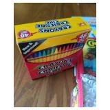 Collection of kids promotional products and coloring supplies