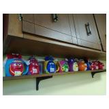 Collection of M & M cups with plush toys