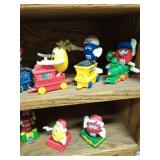 Collection of M&M Toys with Shelf