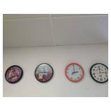 Eight Promotional Clocks