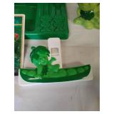 Large Collection of Green Giant Toys and Décor