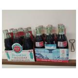Two Six Packs of Coca-Cola Bottles
