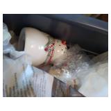 Two Bins Full of Holiday Salt and Pepper Shakers