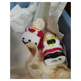 Two Bins Full of Holiday Salt and Pepper Shakers