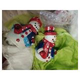 Two Bins Full of Holiday Salt and Pepper Shakers