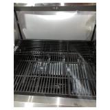 DYNA-GLO 4-BURNER PROPANE GAS GRILL IN STAINLESS STEEL WITH GRIDDLE. SEE PICTURES!!