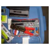 wire stripping electrical kit, metal flashlight, battery tester, and chirper and outlet tester and remote control