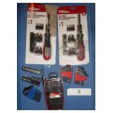 Two ratcheting screwdriver sets and bits, hex wrenches and a case of driver bits