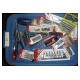 Lot of punches, large needle nose plier, screwdriver and lot of different bit sets, hex wrenches, nut driver sets