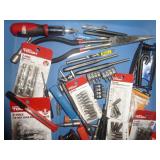 Lot of punches, large needle nose plier, screwdriver and lot of different bit sets, hex wrenches, nut driver sets