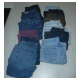 12 pair of womens jeans size 12 and 14, includes Lee, Levis, LL Bean, a couple are insulated, all in very good condition