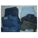 12 pair of womens jeans size 12 and 14, includes Lee, Levis, LL Bean, a couple are insulated, all in very good condition