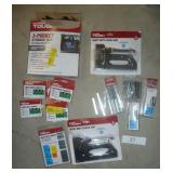 lot of staple guns (untested), bunch of staples, storage net