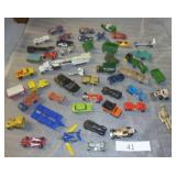 bunch of matchbox cars, a few unusual ones, space shuttle, Nasa truck with rocket, stretch limo