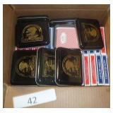 37 decks of cards and 8 tin boxes to store decks in