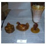 For you Amber glass collectors, nesting hen, octogon candy dish and a large striped vase with cameo at the base