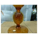 For you Amber glass collectors, nesting hen, octogon candy dish and a large striped vase with cameo at the base