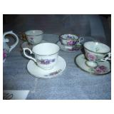 Very pretty china teapot and 5 cups and saucers