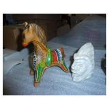 a somewhat ecclectic group,  metal horse bank, stone face and stone bird, not sure if the bookends are stone or resin