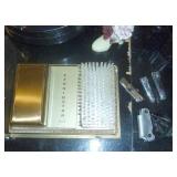 Vintage dresser items, New Bennington comb and brush set, nail clippers, stetson cologne, clock