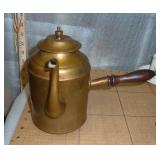 a couple of unique collectibles, teapot with a side handle and a tin climbing monkey