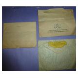 misc collection of vintage items, cardboard serving plate, hair nets, toothpick angels for cake decorating I assume, old sunbeam iron box, slide rule, baby shoes, and a mustimeter