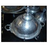 lot of vintage silverplate serving dishes, most of them are quadruple plate, and a set of silver spoons and a tin with a pewter rabbit scene
