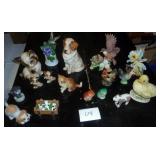Group of porcelain and ceramic Animal figurines, cats dogs birds and even frogs
