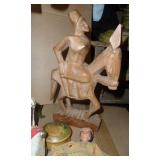 Lot of unique international items, 2 tall metal candle holders, wood carved man on a donkey, and 4 dolls.