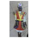 Lot of unique international items, 2 tall metal candle holders, wood carved man on a donkey, and 4 dolls.