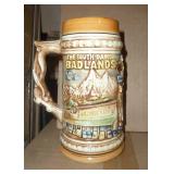 3 Steins in great condition, South Dakota Badlands and Mount Rushmore, Budweiser St Patricks Day and a German lidded stein