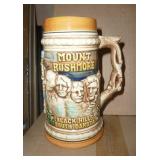 3 Steins in great condition, South Dakota Badlands and Mount Rushmore, Budweiser St Patricks Day and a German lidded stein