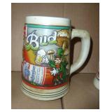 3 Steins in great condition, South Dakota Badlands and Mount Rushmore, Budweiser St Patricks Day and a German lidded stein